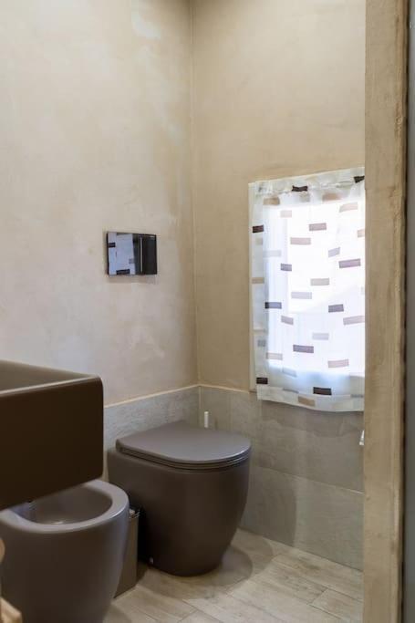 Casa Vacanze L'Angolo Fiorito 贝托勒 外观 照片